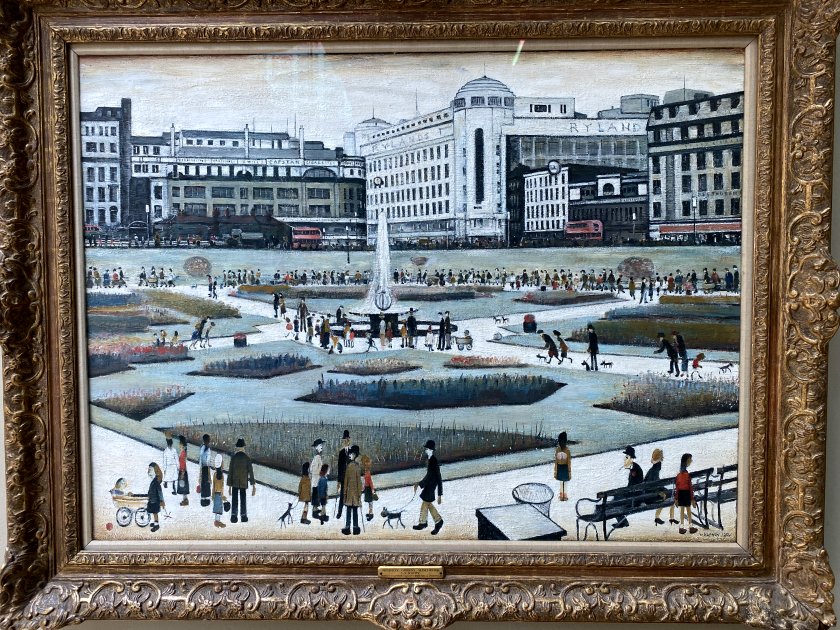 This L S Lowry painting depicts Piccadilly Gardens in the 1950s