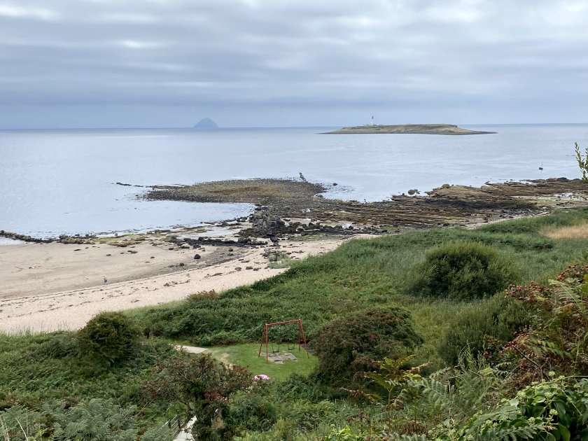 View from Kildonan to the small islands of Pladda (nearer camera) and Ailsa Craig