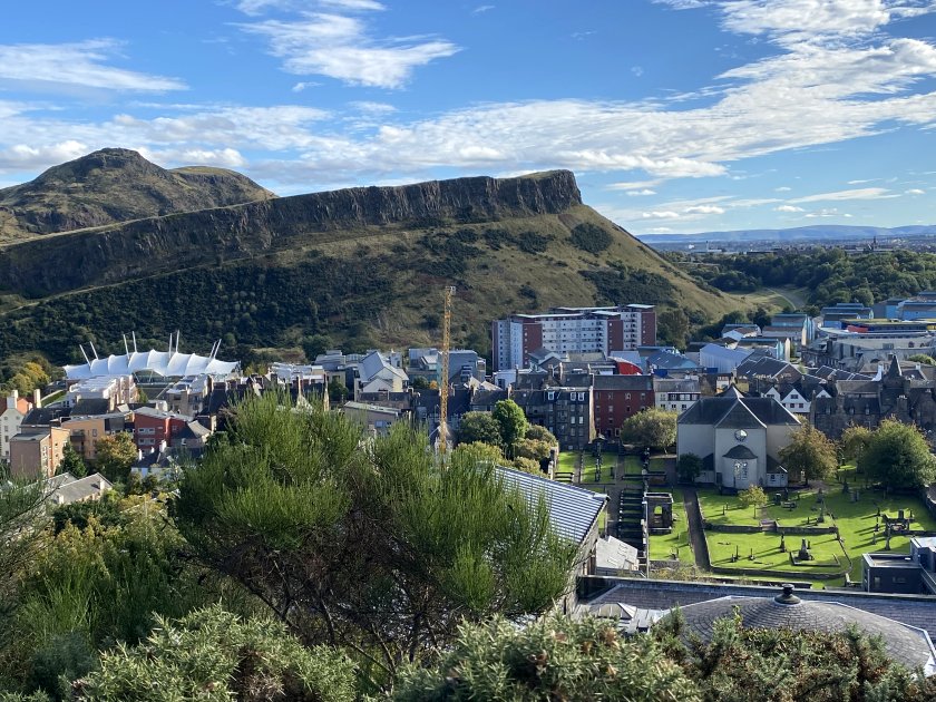 Arthur's Seat and the Salisbury Crags. Also visible is Canongate Kirk.