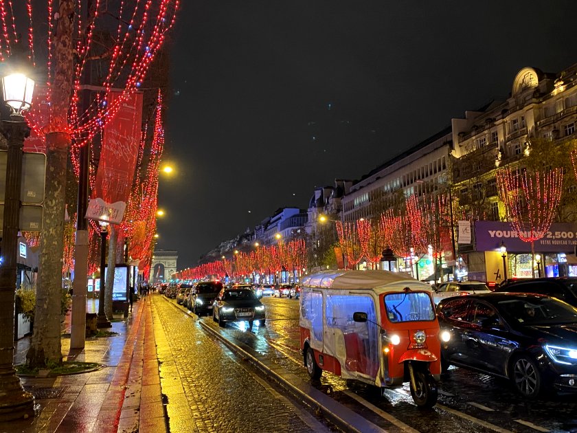 Rain-soaked Avenue des Champs-Élysées