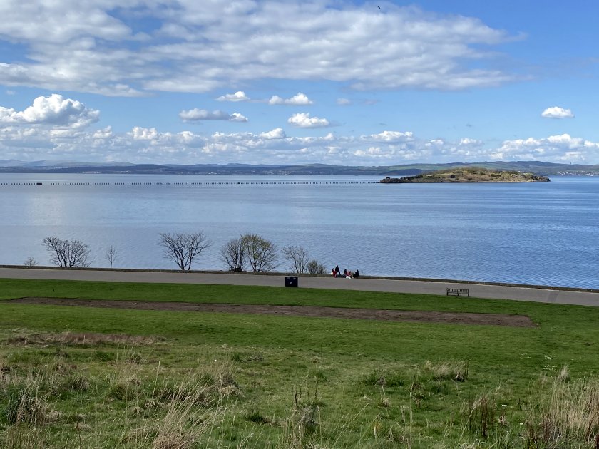 This similar view shows Cramond Island, a tidal island with the causeway markers visible